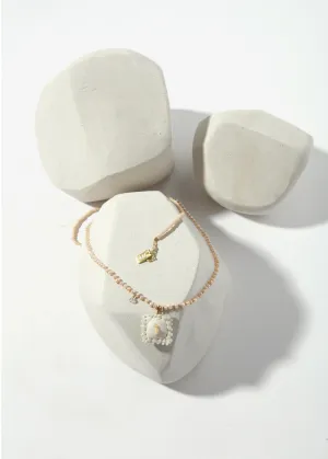 NA NECKLACE - POUCH ON PEARLS